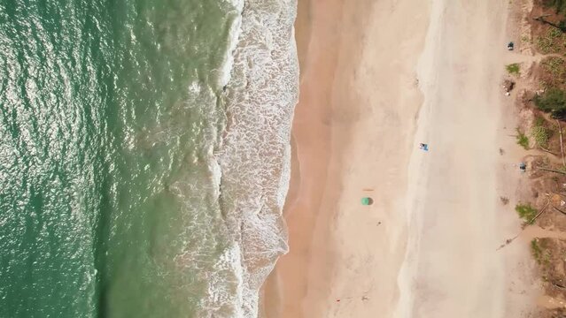 Beach blue water in the beach corner. sea View from sky with drone camera. Sea Water become in the corner if beach.