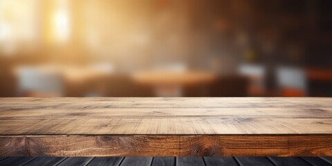 Restaurant or cafe interior background with wooden table top - ideal for showcasing food products.