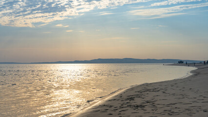 Obraz premium beautiful sunset at inland sea beach