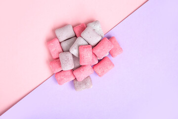 Chewing gums on color background