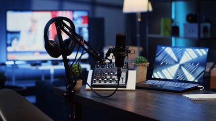 Panning shot of podcast microphone used to record discussions for internet livestreaming channel...
