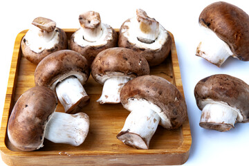 organic mushrooms in a wooden cup. Autumn food.
