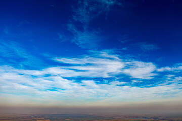 Fototapeta na wymiar Celestial Elegance: Aerial View of Infinite Blue Sky