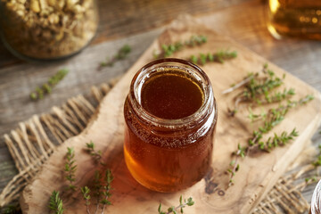 A jar of thyme syrup for cough