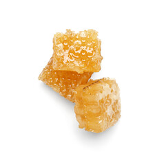 Sweet honeycombs on white background