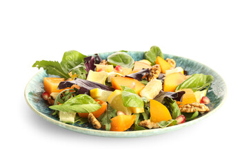 Plate of delicious salad with persimmon, pomegranate seeds and walnut on white background