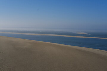 A view from the top of the Pilat dune with a breathtaking view of the Arguin sandbank. La...