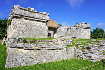 Tulum, Quintana Roo, Mexico - December 15, 2023: One side view of The Great Palace ruins at Tulum, The Maya City of the Dawning Sun.