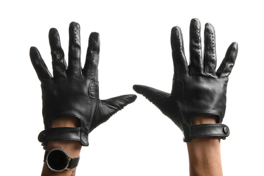 Male hands in black leather gloves isolated on white background, closeup