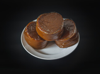 three traditional Chinese New Year Sweet Rice Cakes or Nian Gao in Mandarin, top angle view.