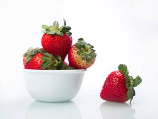 Studio photo of strawberries in a bowl.