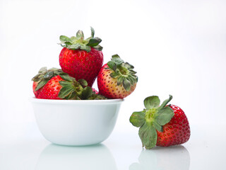 Strawberries in a white bowl.