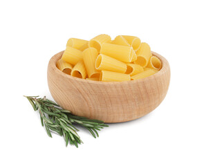 Wooden bowl with raw tortiglioni pasta an d rosemary on white background