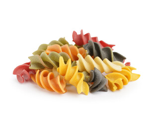 Colorful uncooked fusilli pasta on white background
