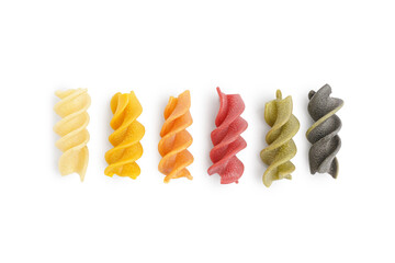 Colorful uncooked fusilli pasta on white background