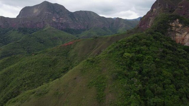 Flyover of rugged mountain jungle landscape in green Bolivian Amazonas