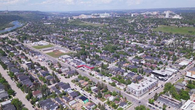 The neighbourhoods of Hillhurst, Upper Hillhurst, Kensington and Westmount in the City of Calgary are flown overhead by an aerial drone.