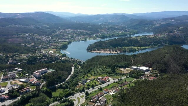 Drone establishing shot of Douro River and cityscape in Gondomar Portugal