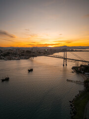 beautiful sunset on the Hercílio Luz bridge, in Florianópolis, Santa Catarina. Overlooking the mainland of the city