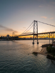 beautiful sunset on the Hercílio Luz bridge, in Florianópolis, Santa Catarina. Overlooking the mainland of the city