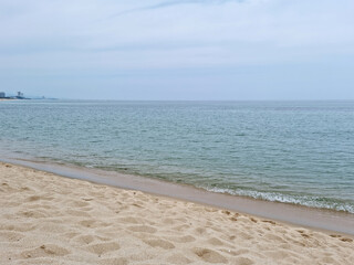 Soft beautiful ocean wave on sandy beach. Beach landscape.