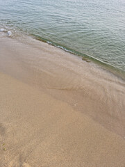 
This is a close-up of the beach sand and waves.