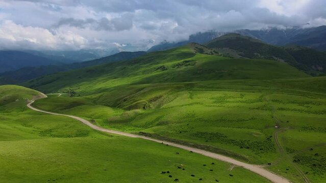 Actoprak's green mountain pass aerial view day's charm cloud embrace majestic Mountain pass scenic wonder rejuvenating retreat captivating. Mountain pass aesthetic joy pristine wilds untouched.