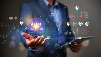 Asset management concept, Businessman Holding asset management and Icon  on virtual display. Financial Property Digital assets.