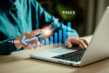 Businesswomen analyzed the cost reduction graph,.strategy control cost reduction for efficient business.planning and management of the business project for effective