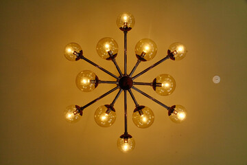 Modern Industrial Chandelier with Vintage Bulbs, Warm Glow, Upward View