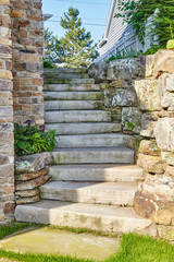 Rustic Stone Staircase and Garden Pathway in Sunlight