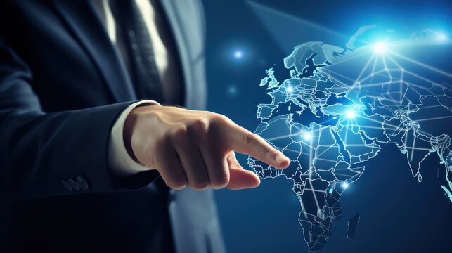 A businessman's hand touches a world map infographic panel, photo, on a blue background. Touch screen technology.