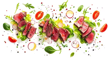Fotobehang Falling steak salad ingredients, sliced beefsteak isolated on a white background. © morepiixel
