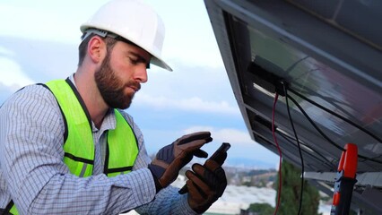engineer technician checking output voltage level of inverter, electrician measuring power on solar panels. - Powered by Adobe