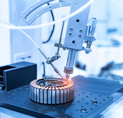 soldering iron tips of robotic system for automatic point soldering for  rotor assembly at factory