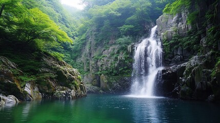 Fototapeta na wymiar waterfall on the slopes of the mountains