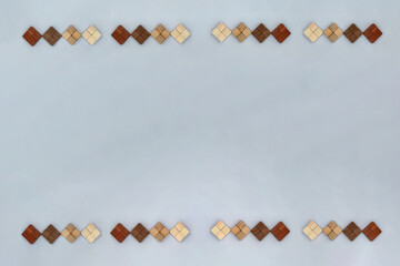 4つのブロックを組み合わせたひし形のグレーの背景フレーム
