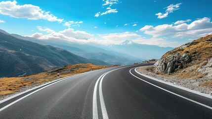 An empty mountain highway on a sunny day, bird eye view