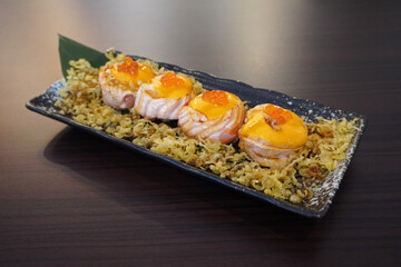 Creamy salmon sushi rolls. Japanese food, selective focus