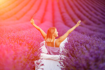 Woman lavender field. A middle-aged woman sits in a lavender field and enjoys aromatherapy....