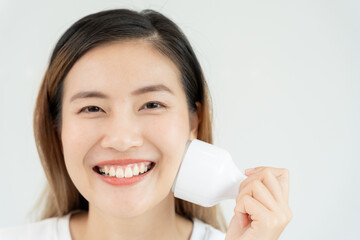beautiful Asian women use tools to tighten their pores. Healthy faces. Facial care and treatment....