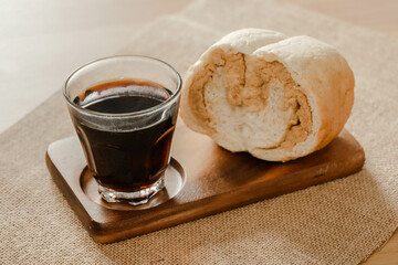 Coffee paired with bread stuffed with flossy pork in the morning.