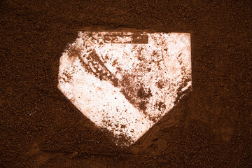 red clay baseball field and various views of the baseball home plate