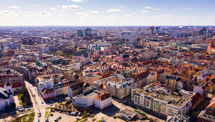 Aerial view of Poznan modern cityscape overlooking new residential areas and historical center on...
