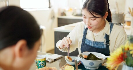 Japanese woman, eating and lunch in restaurant, chopsticks and hungry with plate for nutrition....