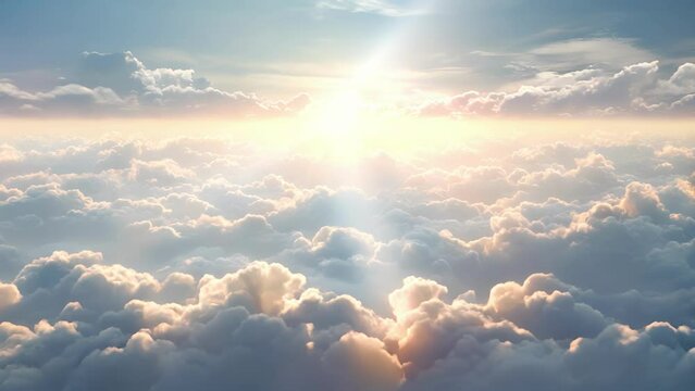 Dense lumpy mounds of fluffy clouds illuminated by bright sunbeams