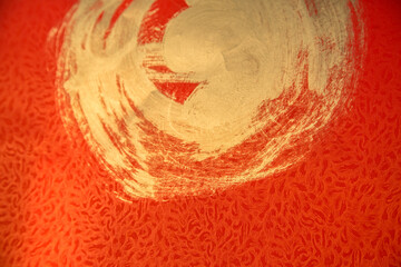 Chinese red paper and hand-painted golden lacquer create a beautiful background for the Year of the...