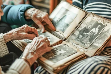 Foto op Plexiglas Old persons flipping through old photo albums. Joy and nostalgia, share their memories, pointing out family members and significant events © Degimages