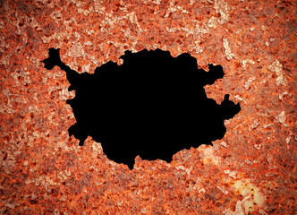 Hole in the Rusty Metal