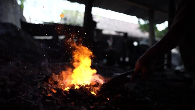 slow motion of the fire in the blacksmith's kiln